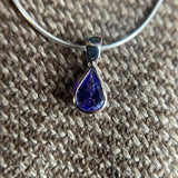 9CT WHITE GOLD PEAR CUT RUBOVER SET TANZANITE PENDANT