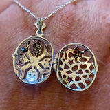 SILVER CUBIC ZIRCONIA SET OPENWORK LOCKET