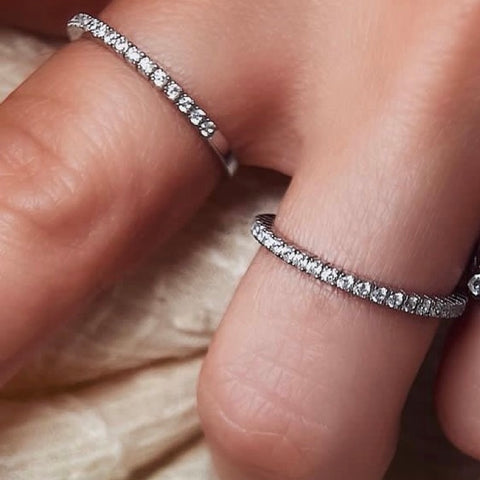 RHODIUM PLATED SILVER MICRO SET CUBIC ZIRCONIA HALF ETERNITY RING