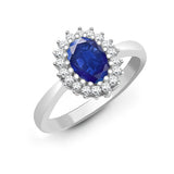 9CT WHITE GOLD OVAL SAPPHIRE & DIAMOND CLUSTER RING