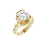 14CT GOLD EMERALD-CUT FOREVER ONE COLOURLESS MOISSANITE & BAGUETTE DIAMOND ENGAGEMENT RING