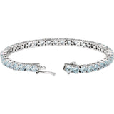 14CT WHITE GOLD SKY BLUE TOPAZ TENNIS BRACELET
