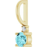 14CT GOLD BLUE ZIRCON & DIAMOND PENDANT