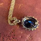 9CT GOLD BLACK SAPPHIRE & DIAMOND PENDANT