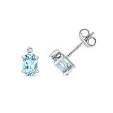 9CT WHITE GOLD OVAL AQUAMARINE & DIAMOND STUDS