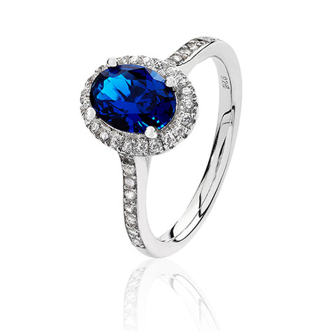 RHODIUM PLATED SILVER OVAL CUT BLUE CUBIC ZIRCONIA HALO RING